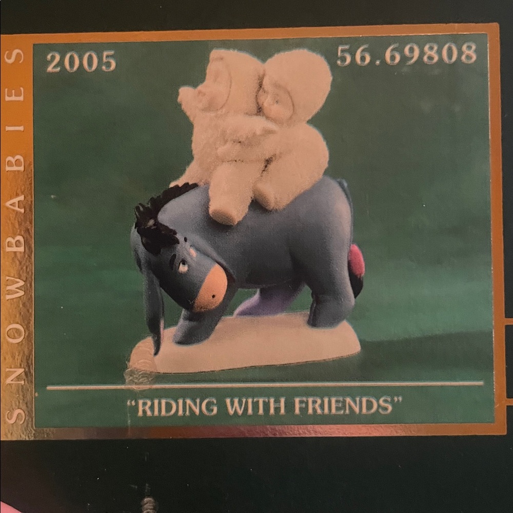 Snowbabies Riding with friends   Disney Eeyore